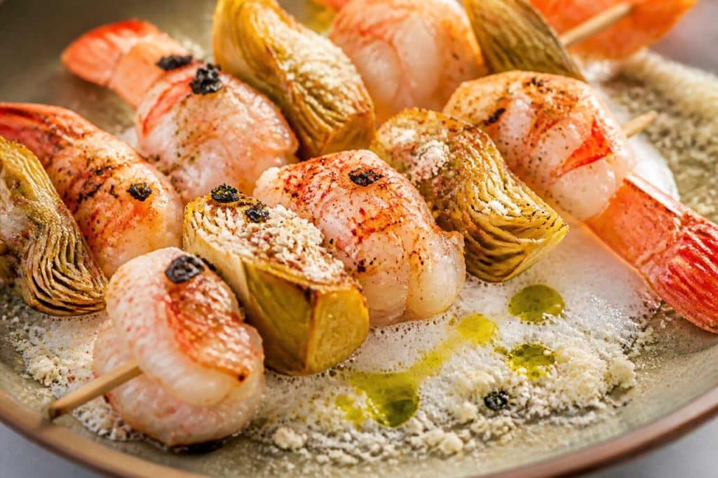 Recette de brochettes de langoustines et artichauts à l'écume de mer